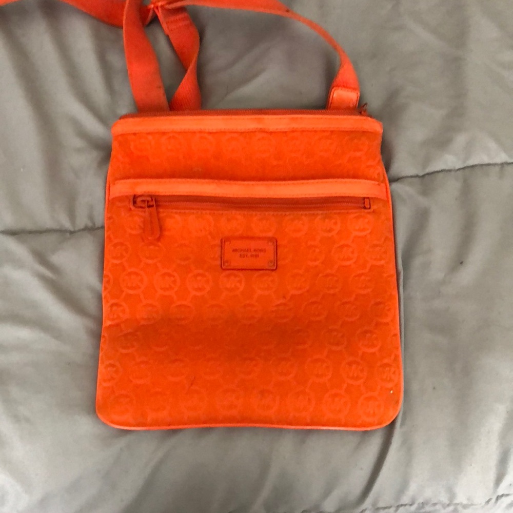 Orange micheal cors purse